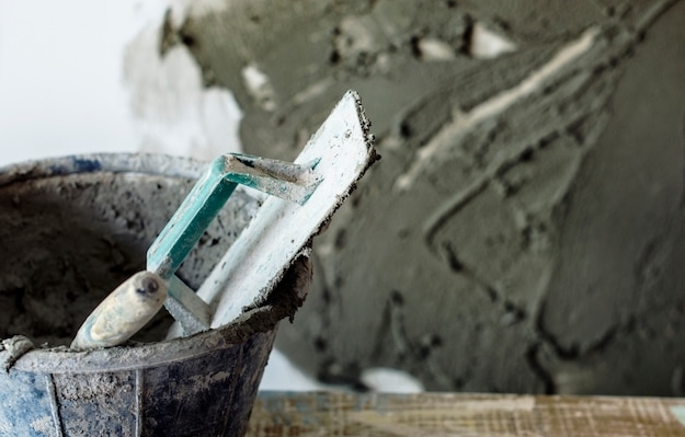 Сколько стоит штукатурка фасада частного дома